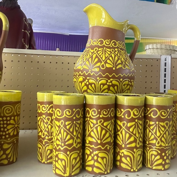 pitcher and clay cups
